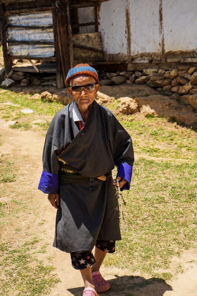 A Bhutanese old man with glasses