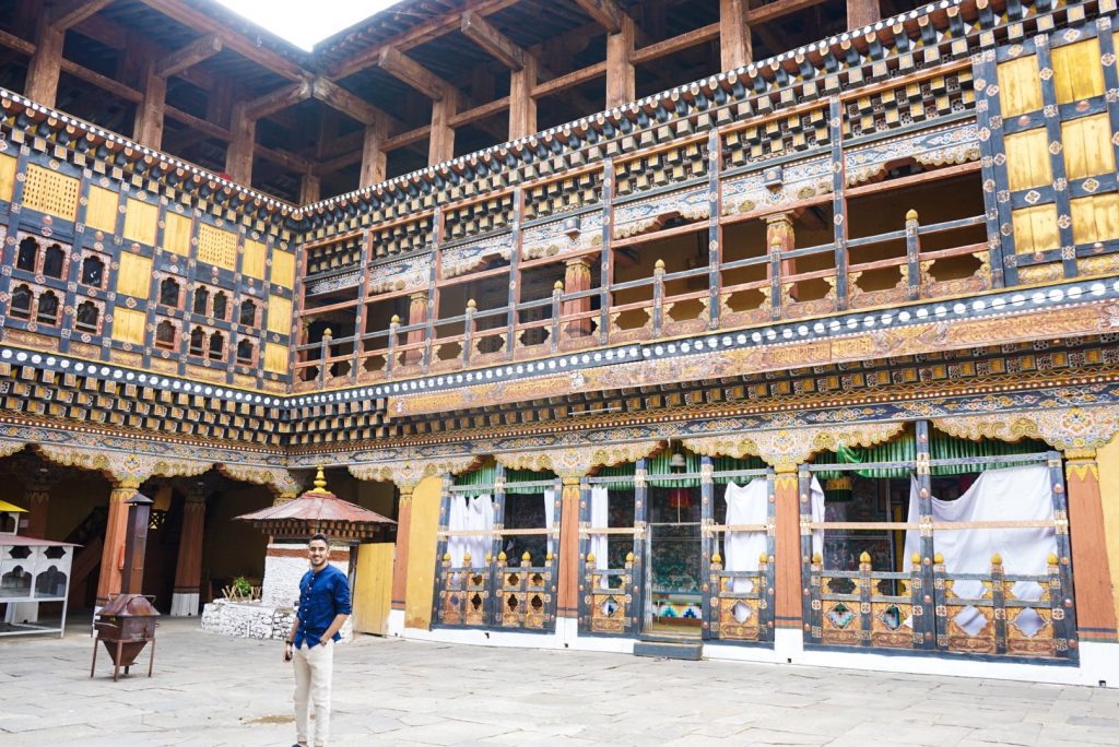 Tourist in front of Paro Dzong