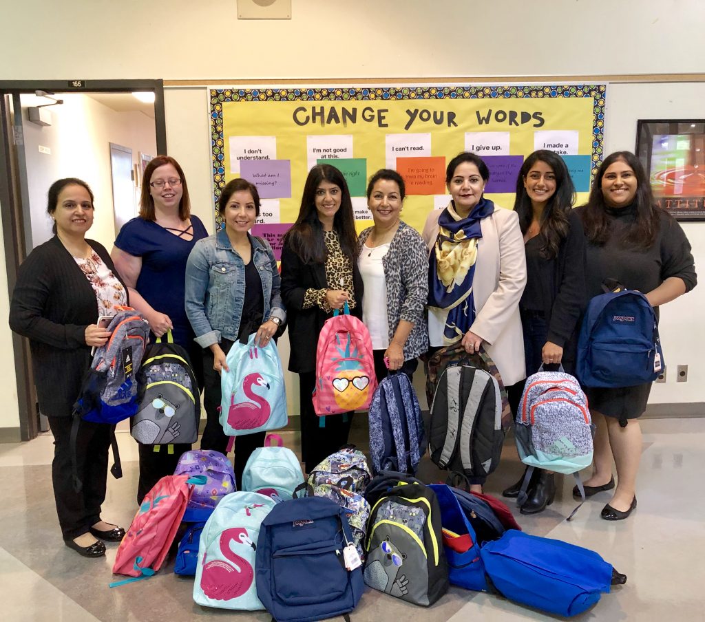 Delivering Backpack to different inner-city school with The Saheli Foundation.