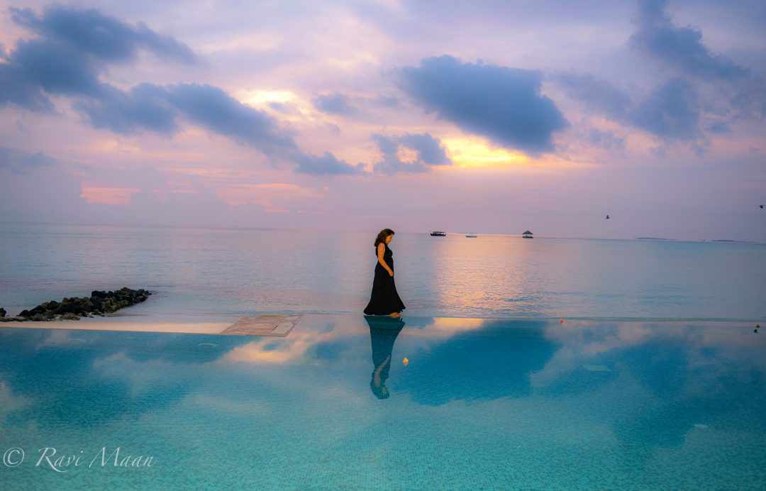 Woman's reflection in the water