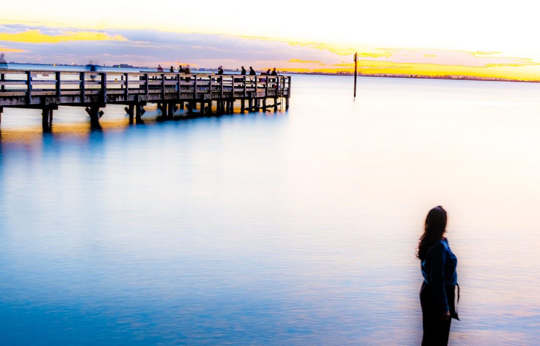 female image over looking an ocean