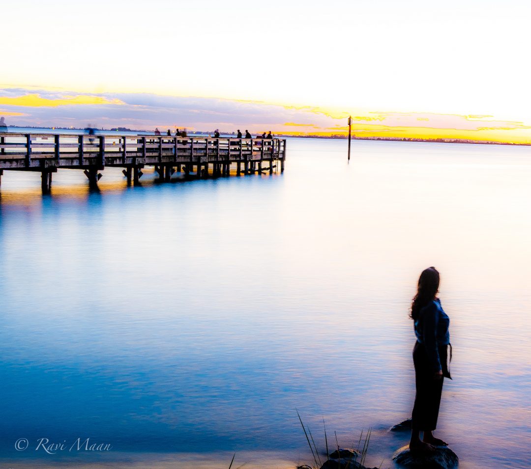 female image over looking an ocean